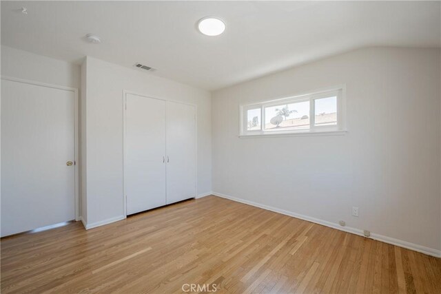 14314 De Alcala Dr, La Mirada, CA 90638 - unfurnished bedroom featuring light wood-style floors and a closet