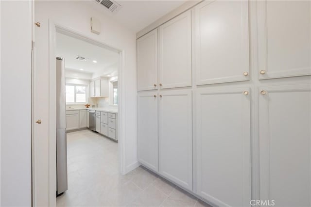 14314 De Alcala Dr, La Mirada, CA 90638 - corridor featuring light tile patterned floors and recessed lighting
