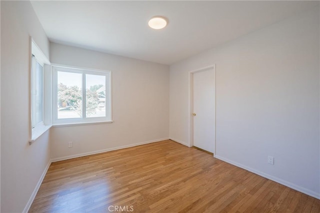 14314 De Alcala Dr, La Mirada, CA 90638 - unfurnished room with light wood-style floors and baseboards