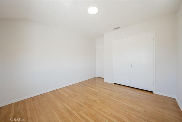14314 De Alcala Dr, La Mirada, CA 90638 - unfurnished bedroom with light wood-style floors and a closet