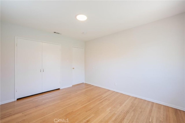 14314 De Alcala Dr, La Mirada, CA 90638 - unfurnished bedroom featuring light wood-type flooring and a closet