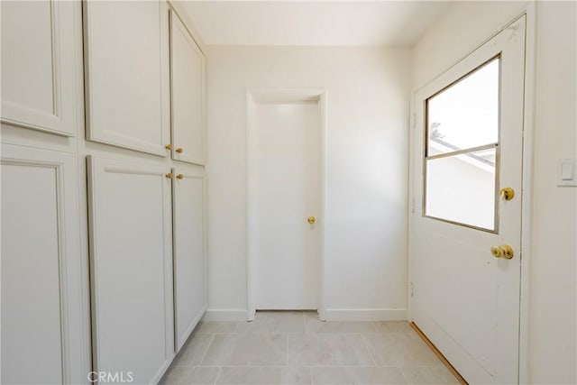 14314 De Alcala Dr, La Mirada, CA 90638 - corridor with baseboards and light tile patterned floors