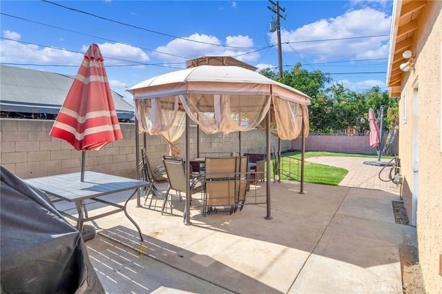 3341 Wisconsin Ave, South Gate, CA 90280 - fenced backyard featuring outdoor dining space, a gazebo, and a patio area