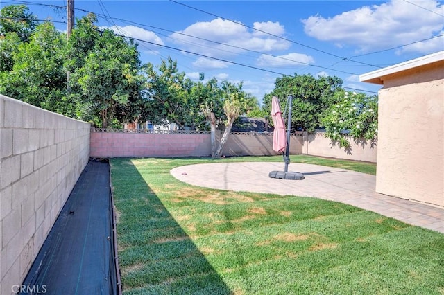 3341 Wisconsin Ave, South Gate, CA 90280 - fenced backyard with a patio area