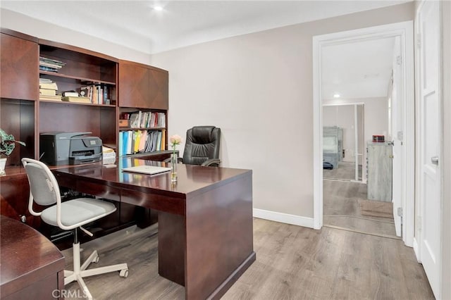 3341 Wisconsin Ave, South Gate, CA 90280 - home office with wood finished floors and baseboards