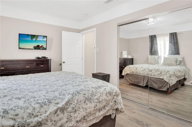 3341 Wisconsin Ave, South Gate, CA 90280 - bedroom featuring wood finished floors and a closet