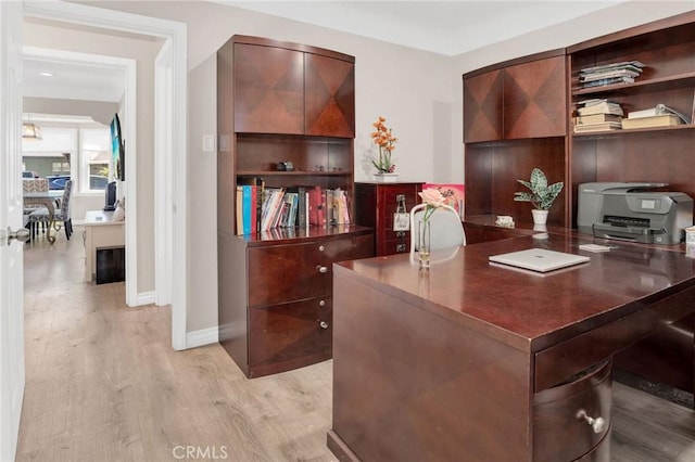 3341 Wisconsin Ave, South Gate, CA 90280 - home office with wood finished floors and baseboards