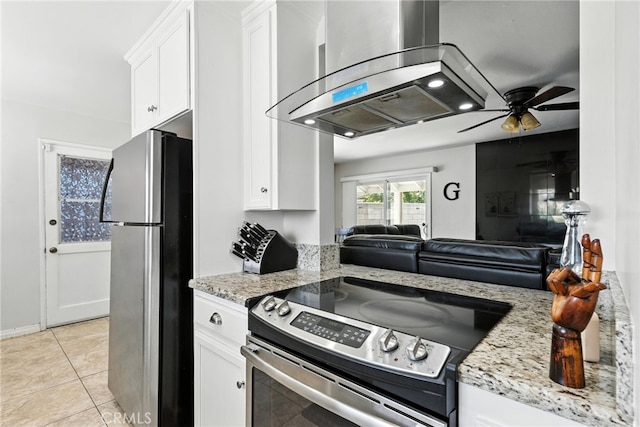 4220 Monticello Ave, Riverside, CA 92503 - kitchen featuring stainless steel appliances, ventilation hood, white cabinets, and light stone countertops