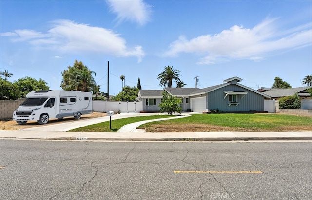 4220 Monticello Ave, Riverside, CA 92503 - view of front facade with an attached garage and concrete driveway