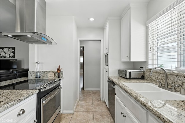 4220 Monticello Ave, Riverside, CA 92503 - kitchen featuring appliances with stainless steel finishes, island exhaust hood, white cabinets, light stone countertops, and recessed lighting