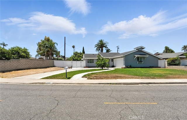 4220 Monticello Ave, Riverside, CA 92503 - view of front facade with a garage and driveway
