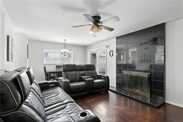 4220 Monticello Ave, Riverside, CA 92503 - living area with ceiling fan, wood finished floors, a chandelier, and a tiled fireplace