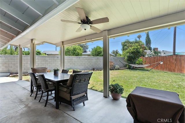 4220 Monticello Ave, Riverside, CA 92503 - fenced backyard with a ceiling fan, outdoor dining space, and a patio