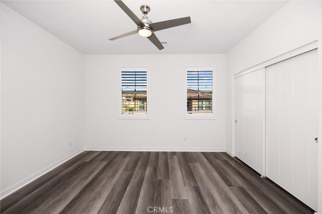 26 Prominence, Lake Forest, CA 92630 - unfurnished bedroom with dark wood-type flooring, a closet, and ceiling fan