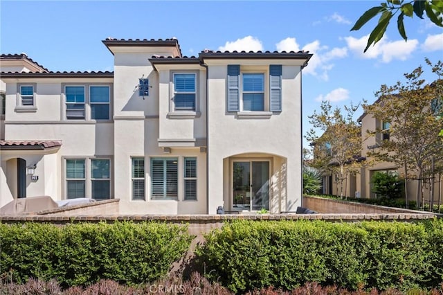 26 Prominence, Lake Forest, CA 92630 - back of house with stucco siding and a tile roof