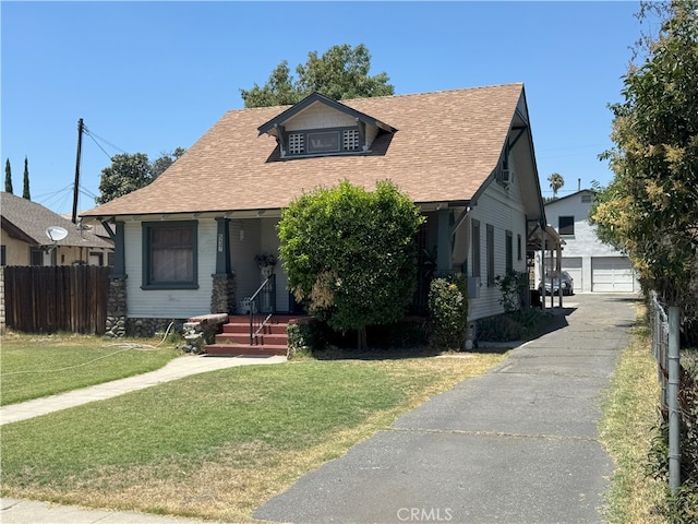 537 San Francisco Ave, Pomona, CA 91767 - view of front of property with an outbuilding, a shingled roof, and a garage