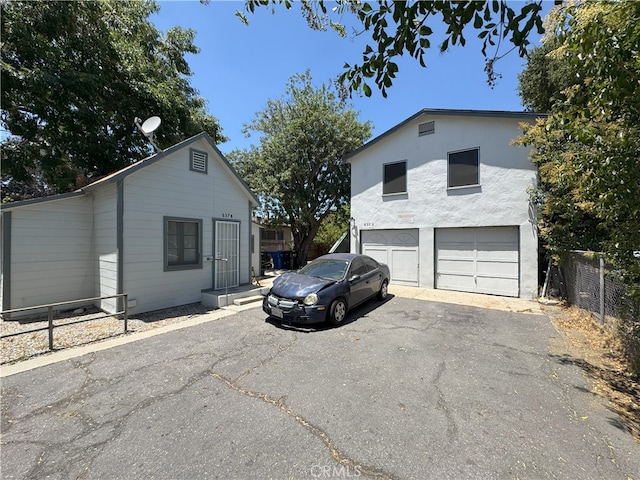 537 San Francisco Ave, Pomona, CA 91767 - view of property exterior with driveway and a garage