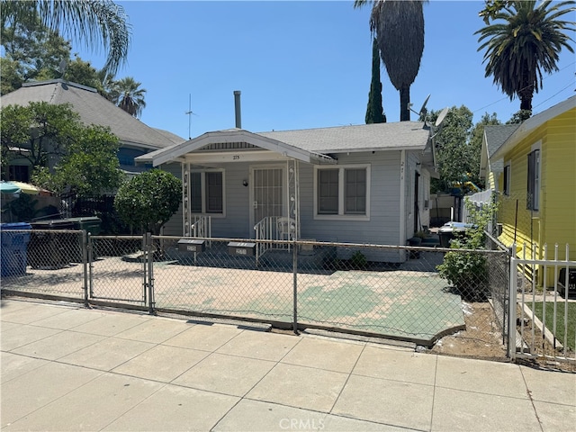 275 S Rebecca St, Pomona, CA 91766 - view of front of house featuring a gate and a fenced front yard