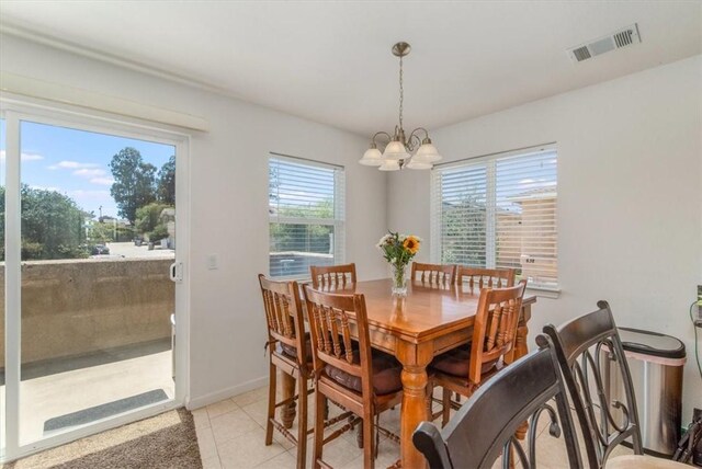 177 Jerome Ct, Nipomo, CA 93444 - dining area with a chandelier and light tile patterned floors