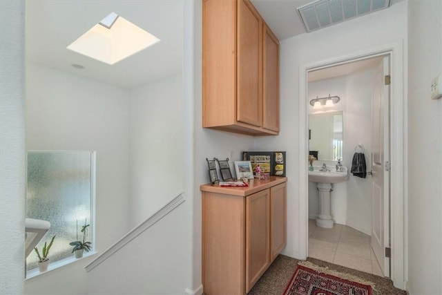 177 Jerome Ct, Nipomo, CA 93444 - hall featuring light tile patterned floors, a skylight, and plenty of natural light