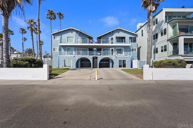 803 S Pacific St Unit 1, Oceanside, CA 92054 - view of front of house featuring driveway and a garage