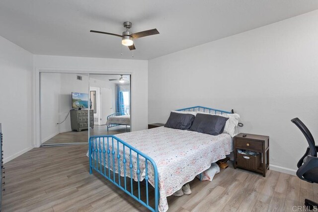 803 S Pacific St Unit 1, Oceanside, CA 92054 - bedroom featuring wood finished floors, ceiling fan, and a closet
