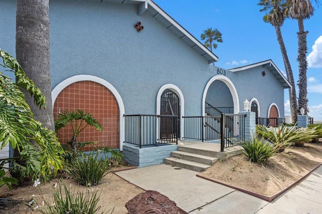 803 S Pacific St Unit 1, Oceanside, CA 92054 - mediterranean / spanish-style home with stucco siding and a porch