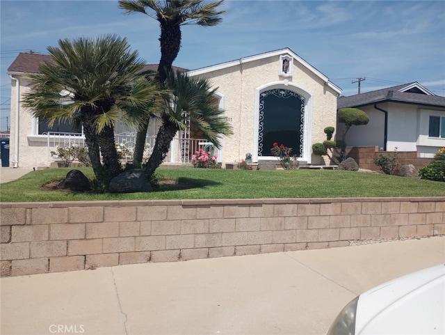 1617 W 125th St, Los Angeles, CA 90047 - view of front of house with stucco siding and a front yard