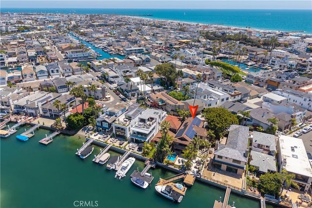 3908 Channel Pl, Newport Beach, CA 92663 - aerial view of property's location featuring a large body of water, nearby suburban area, and numerous boat docks