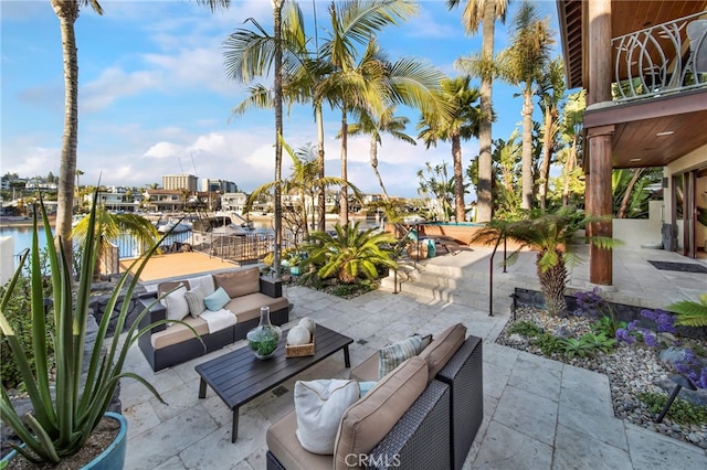 3908 Channel Pl, Newport Beach, CA 92663 - patio / terrace featuring a patio area, an outdoor hangout area, and a water view