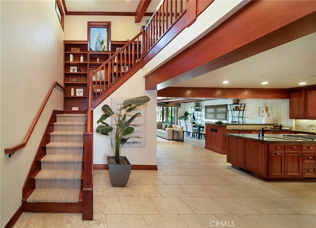 3908 Channel Pl, Newport Beach, CA 92663 - staircase featuring stone tile floors, recessed lighting, and ornamental molding