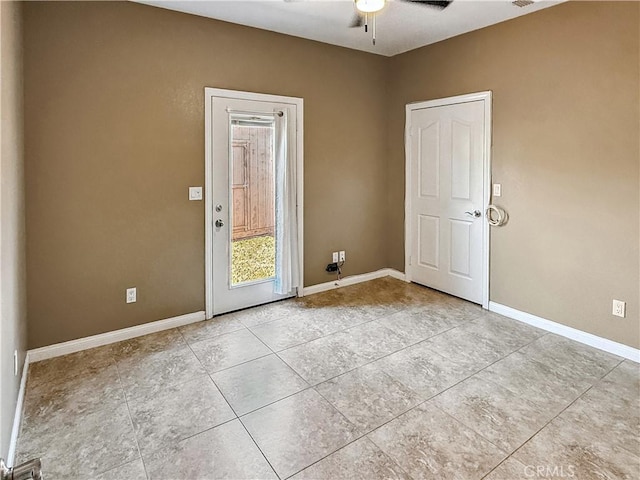 57466 Buena Suerte Rd, Yucca Valley, CA 92284 - unfurnished room featuring ceiling fan and light tile patterned floors