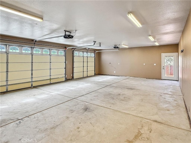 57466 Buena Suerte Rd, Yucca Valley, CA 92284 - garage featuring a garage door opener