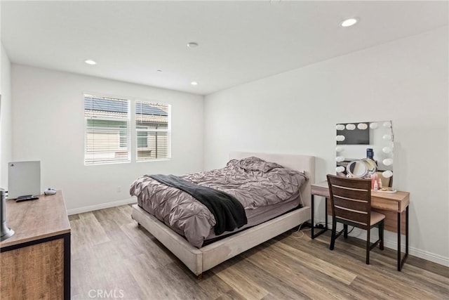 7020 Turin Pl, Eastvale, CA 92880 - bedroom featuring light wood finished floors and recessed lighting