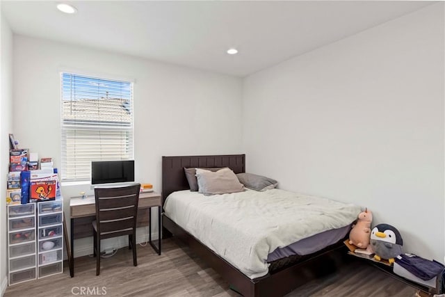 7020 Turin Pl, Eastvale, CA 92880 - bedroom with wood finished floors and recessed lighting