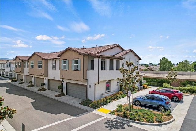 7020 Turin Pl, Eastvale, CA 92880 - view of front facade with a garage, a residential view, stucco siding, and a tiled roof