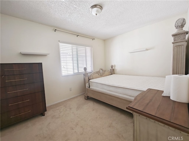 12836 12th St Unit 27, Chino, CA 91710 - bedroom with carpet flooring and a textured ceiling