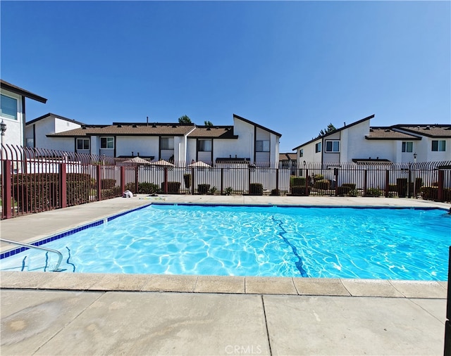 12836 12th St Unit 27, Chino, CA 91710 - community pool featuring a residential view