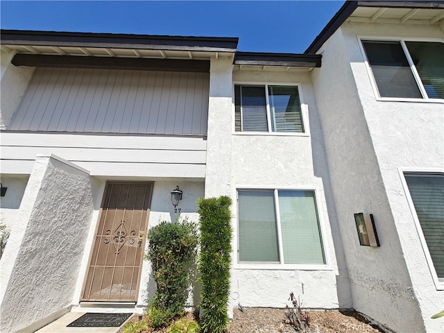12836 12th St Unit 27, Chino, CA 91710 - property entrance featuring stucco siding