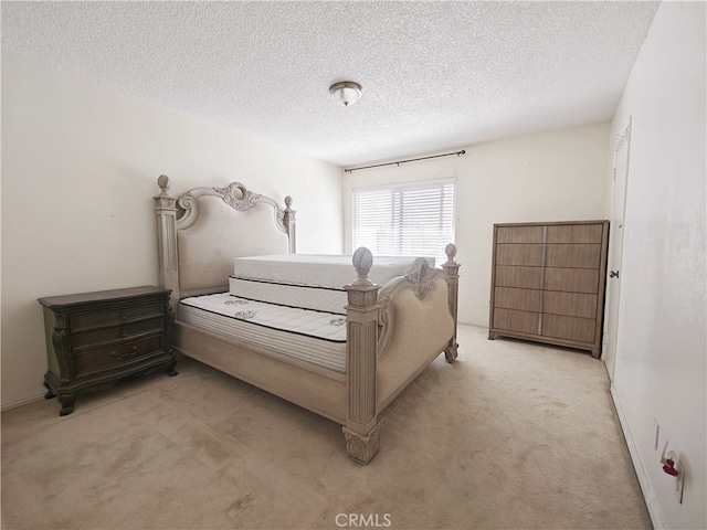 12836 12th St Unit 27, Chino, CA 91710 - bedroom with light colored carpet and a textured ceiling