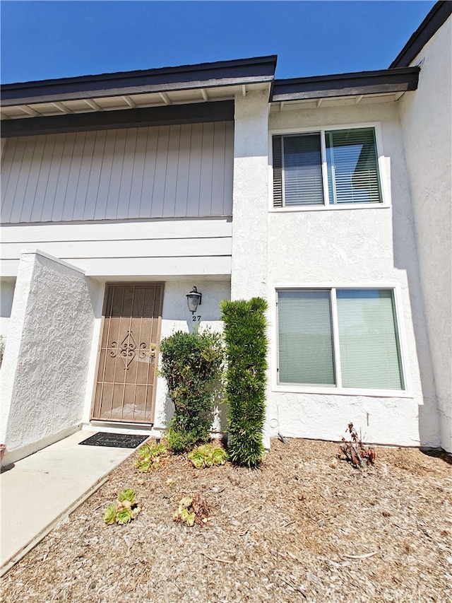 12836 12th St Unit 27, Chino, CA 91710 - property entrance with stucco siding