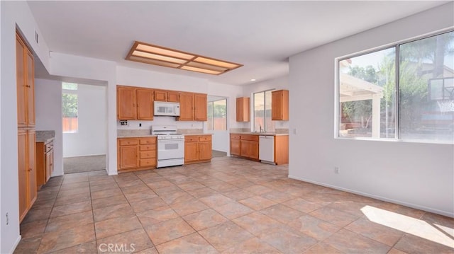 31995 Calle Ballentine, Temecula, CA 92592 - kitchen with white appliances and light countertops
