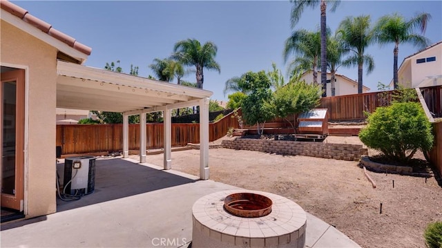 31995 Calle Ballentine, Temecula, CA 92592 - fenced backyard with a patio and an outdoor fire pit