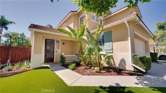 31995 Calle Ballentine, Temecula, CA 92592 - view of front facade featuring stucco siding, a tiled roof, and a garage