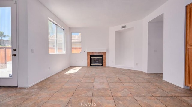 31995 Calle Ballentine, Temecula, CA 92592 - unfurnished living room with a fireplace and baseboards