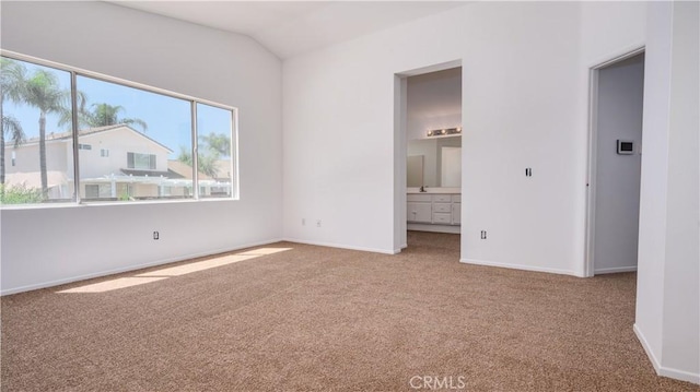 31995 Calle Ballentine, Temecula, CA 92592 - unfurnished bedroom with carpet, lofted ceiling, and ensuite bathroom