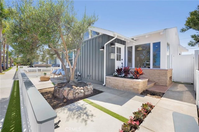 313 14th St, Seal Beach, CA 90740 - view of front of property featuring board and batten siding