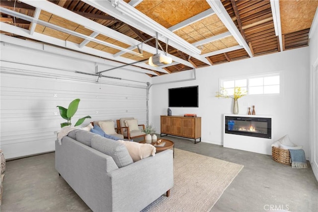 313 14th St, Seal Beach, CA 90740 - living area featuring concrete floors and a glass covered fireplace