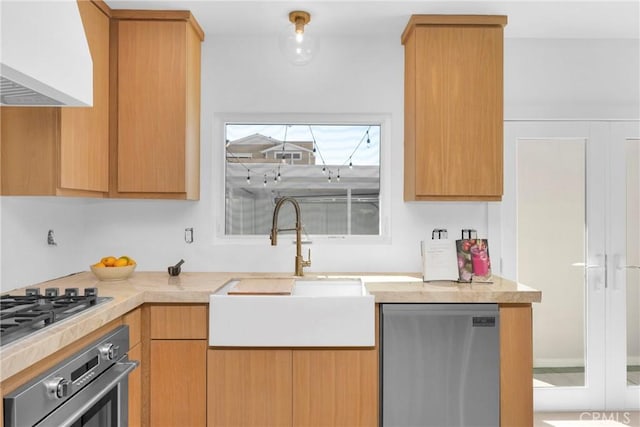 313 14th St, Seal Beach, CA 90740 - kitchen with appliances with stainless steel finishes, custom range hood, light countertops, and modern cabinets