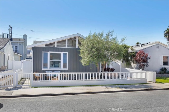 313 14th St, Seal Beach, CA 90740 - view of front of house featuring a fenced front yard and a gate